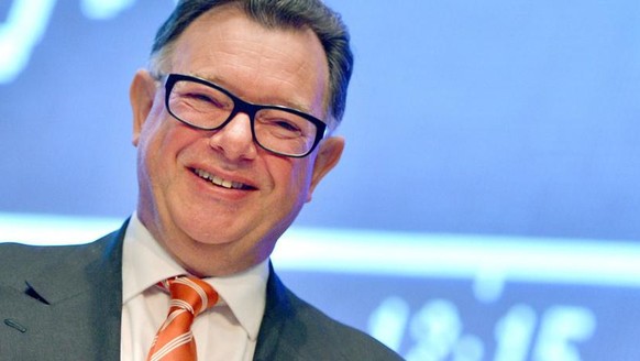 epa03700936 Chairman of the management board of Deutsche Boerse AG (German Stock Exchange) Reto Francioni smiles during the annual general meeting of the joint stock company at Jahrhunderthalle in Fra ...
