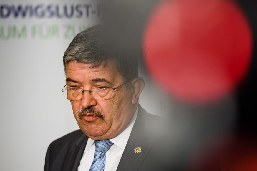 epa07708483 Minister of the Interior of Mecklenburg-Western Pomerania Lorenz Caffier during the visit in Luebtheen, Germany, 10 July 2019. German Minister of Interior, Construction and Homeland Horst  ...