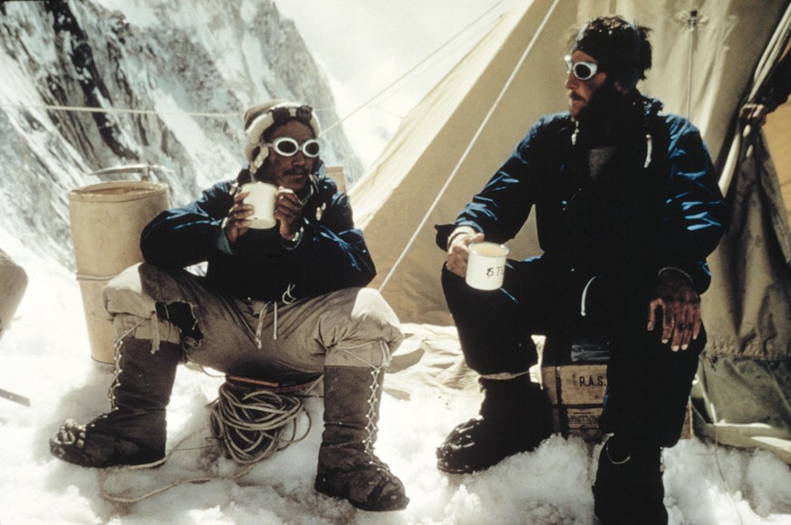 Tenzing Norgay and Edmund Hillary drink tea in the Western Cwm, Tenzing Norgay and Edmund Hillary drink a celebratory cup of tea at Camp IV in the Western Cwm after their successful ascent of Mount Ev ...