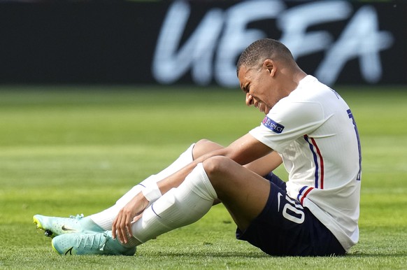 epa09285621 Kylian Mbappe of France reacts during the UEFA EURO 2020 group F preliminary round soccer match between Hungary and France in Budapest, Hungary, 19 June 2021. EPA/Darko Bandic / POOL (REST ...