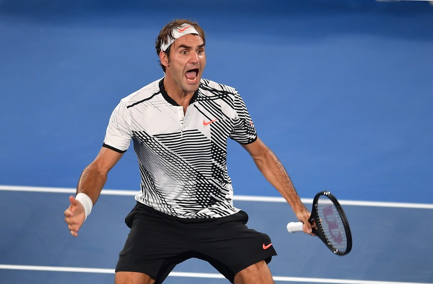 epa05741268 Roger Federer of Switzerland celebrates after winning his Men&#039;s Singles fourth round match against Kei Nishikori of Japan at the Australian Open Grand Slam tennis tournament in Melbou ...