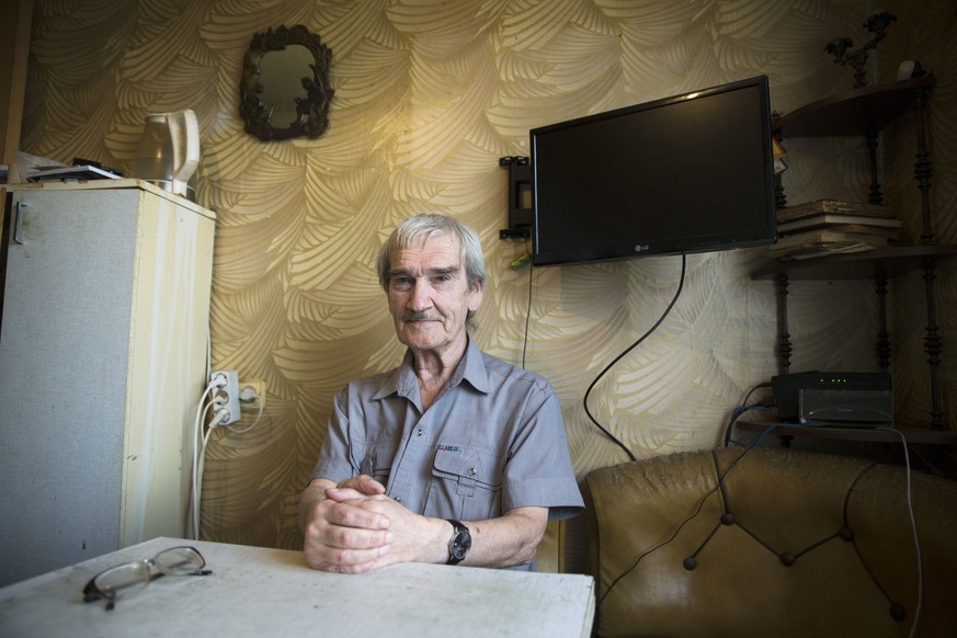 In this Thursday, Aug. 27, 2015 photo former Soviet missile defense forces officer Stanislav Petrov poses for a photo at his home in Fryazino, Moscow region, Russia. On Sept. 26, 1983, despite the dat ...