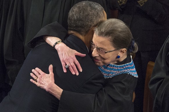 epa08679849 (FILE) US President Barack Obama (L) hugs US Supreme Court Justice Ruth Bader Ginsburg (R) before giving his State of the Union address before a joint session of Congress, on Capitol Hill  ...