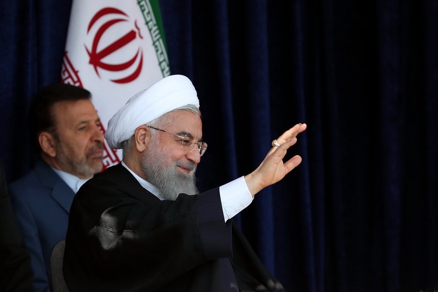 epa06714350 A handout photo made available by the Presidential office shows, Iranian President Hassan Rouhani speaks to the crowd in the city of Sabzevarr, northwestern Iran, 06 May 2018. Media report ...