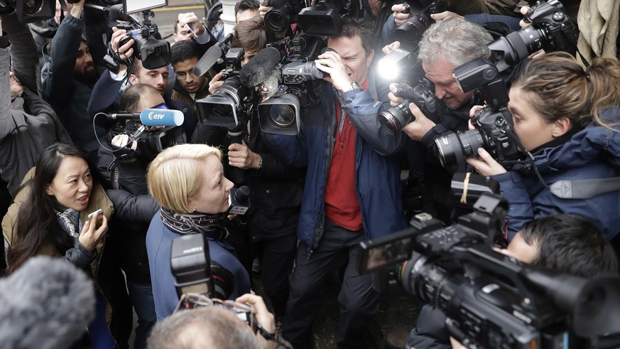 Swedish Chief Prosecutor Ingrid Isgren is surrounded by journalists aas she arrives at the Ecuadorian Embassy to interview Wikileaks founder Julian Assange in London, Monday, Nov. 14, 2016. Assange wi ...