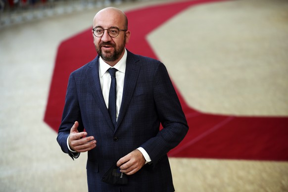 epa08556916 European Council President Charles Michel makes a statement prior to a round table meeting for the fourth day of the European Council meeting in Brussels, Belgium, 20 July 2020. European U ...