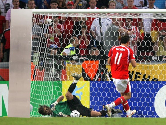 Oleksandr Shovkovskiy (L) from Ukraine makes a save of Swiss Marco Streller (R) during the penalty shoot out during the 2nd round match of 2006 FIFA World Cup between Switzerland and Ukraine in Cologn ...