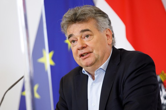 epa08789089 Austrian Vice-Chancellor Werner Kogler speaks during a press conference at the Austrian Chancellery in Vienna, Austria, 31 October 2020. Austrian government introduces further strict measu ...