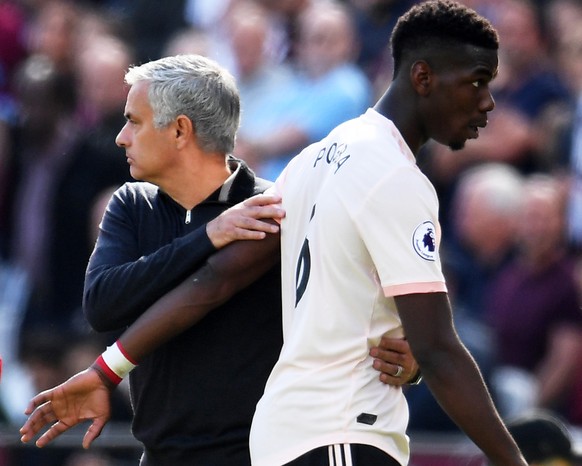 epa07056437 Manchester United manager Jose Mourinho (L) and Paul Pogba (R) react during the English Premier League soccer match between West Ham United and Manchester United in Stratford, east London, ...
