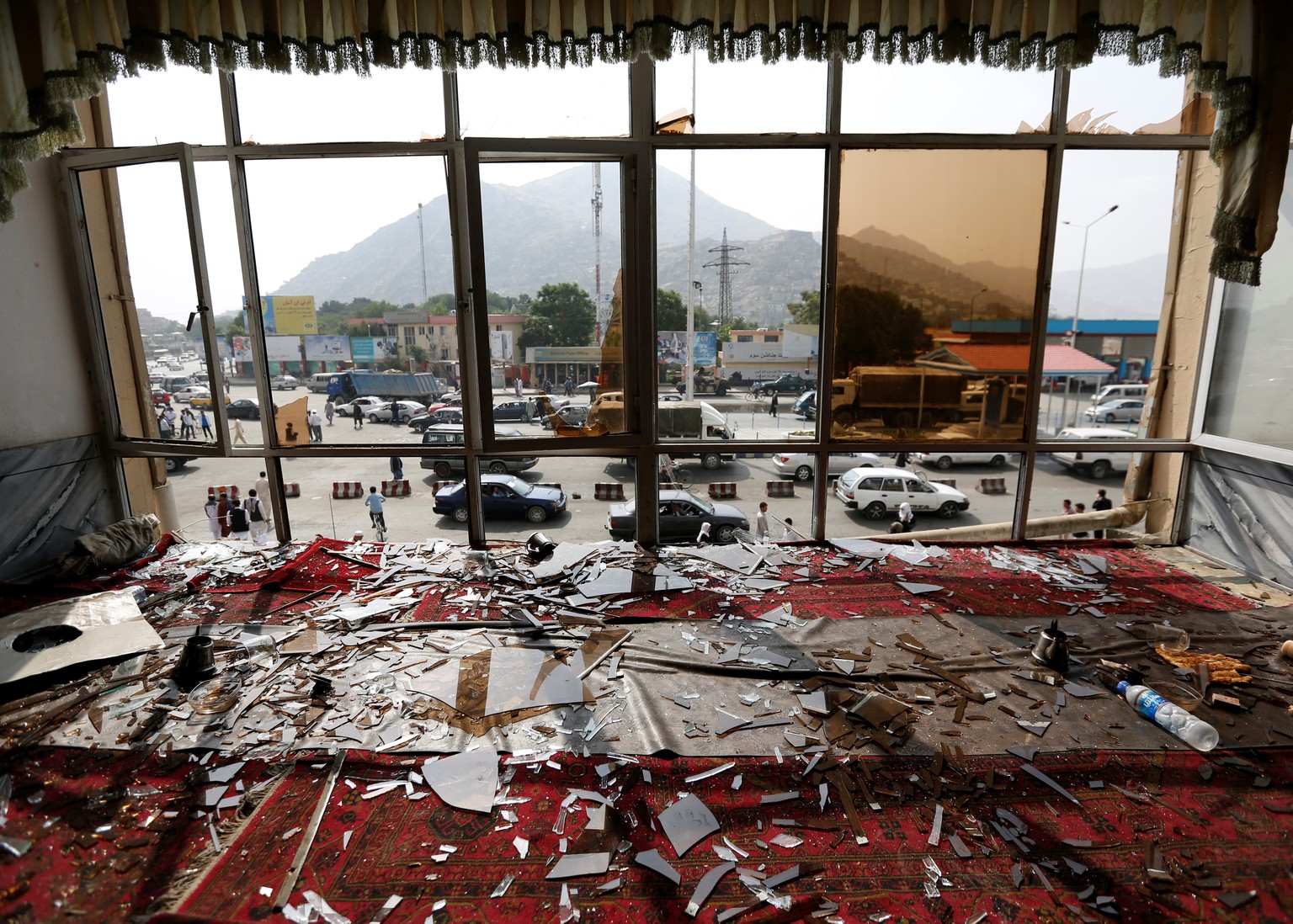 Broken glass and debris are seen inside a resturant a day after a suicide attack in Kabul, Afghanistan July 24, 2016. REUTERS/Mohammad Ismail TPX IMAGES OF THE DAY