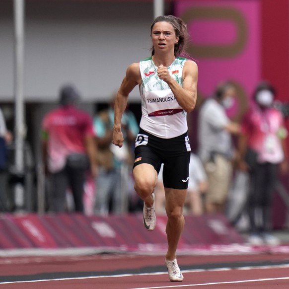Krystsina Tsimanouskaya, of Belarus, runs in the women&#039;s 100-meter run at the 2020 Summer Olympics, Friday, July 30, 2021. Tsimanouskaya alleged her Olympic team tried to remove her from Japan in ...