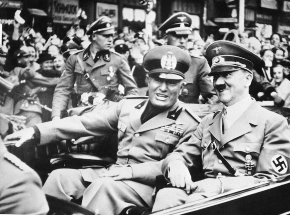 FILE - File photo dated Sept. 28, 1938 showing Italian dictator Benito Mussolini, at left in foreground, and Nazi leader Adolf Hitler, at right, taken just before the four power conference in Munich,  ...