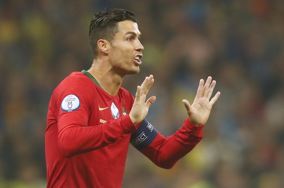 Portugal&#039;s Cristiano Ronaldo gestures during the Euro 2020 group B qualifying soccer match between Ukraine and Portugal at the Olympiyskiy stadium in Kyiv, Ukraine, Monday, Oct. 14, 2019. (AP Pho ...