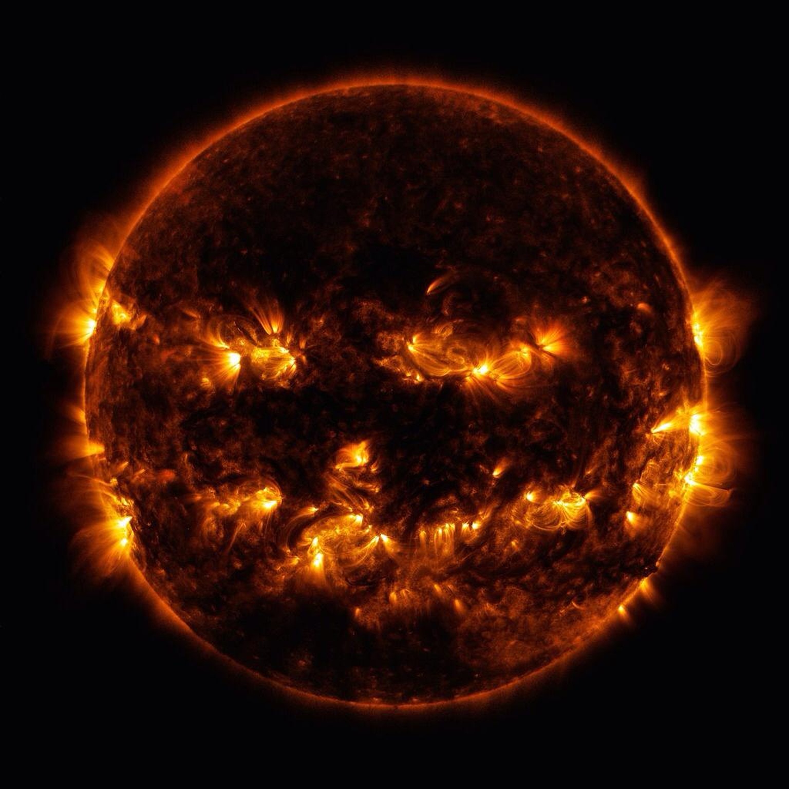 Active regions on the sun combined to look something like a jack-o-lantern’s face on Oct. 8, 2014. The active regions appear brighter because those are areas that emit more light and energy — markers  ...