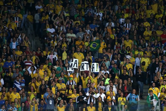 FILE - In this Aug. 12, 2016 file photo, fans cheer for Brazil&#039;s Marta during a quarter-final match of the women&#039;s Olympic football tournament against Australia at the Mineirao Stadium in Be ...