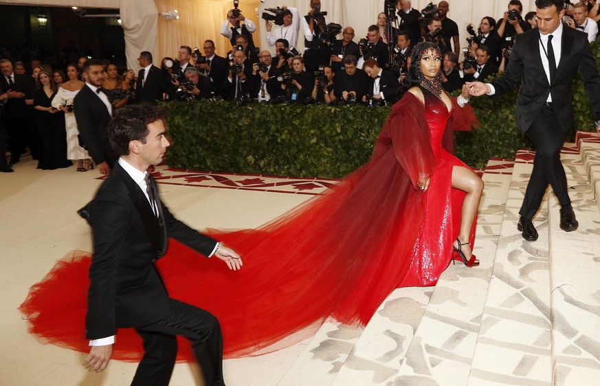 epa06718091 Nicki Minaj arrives on the red carpet for the Metropolitan Museum of Art Costume Institute's benefit celebrating the opening of the exhibit 'Heavenly Bodies: Fashion and the Cath ...