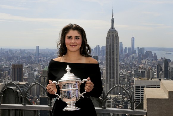 Bianca Andreescu, of Canada, poses with the US Open women&#039;s singles championship trophy at Top of the Rock, Sunday, Sept. 8, 2019, in New York. Andreescu defeated Serena Williams, of the United S ...