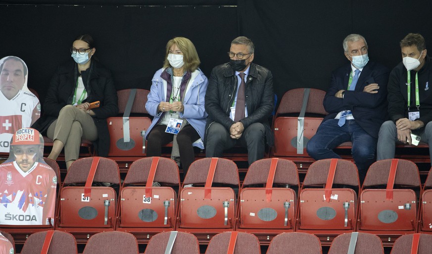Switzerland&#039;s Rene Fasel, 3rd left, President of the International Ice Hockey Federation (IIHF), and his wife Fabienne, 2nd left, look the game, during the IIHF 2021 World Championship preliminar ...