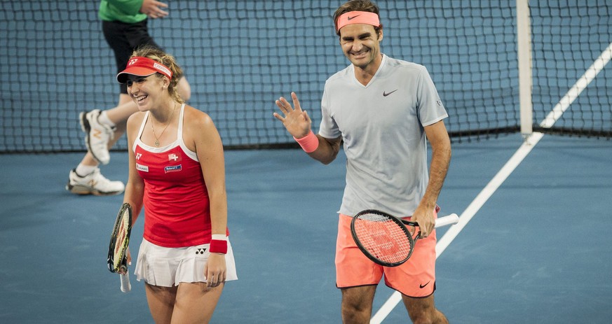 epa05695457 Belinda Bencic and Roger Federer of Switzerland during the mixed doubles match between Great Britain and Switzerland in session 4 of the Hopman Cup at the Arena in Perth, Australia, 02 Jan ...