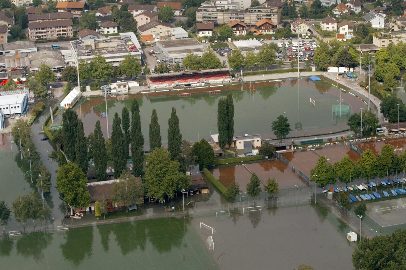 The Lachen soccer stadium of the FC Thun is completely flooded in Thun, Switzerland, Tuesday, August 23, 2005. After several days of continuous rainfall several rivers and lakes in central Switzerland ...