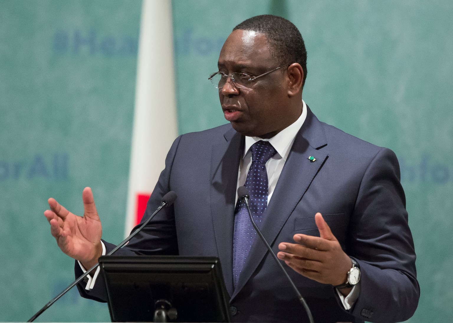 epa06388333 President of Senegal Macky Sall delivers a speech during the Universal Health Coverage Forum (UHC Forum) in Tokyo, Japan, 14 December 2017. Some 300 high-level policymakers gathered during ...
