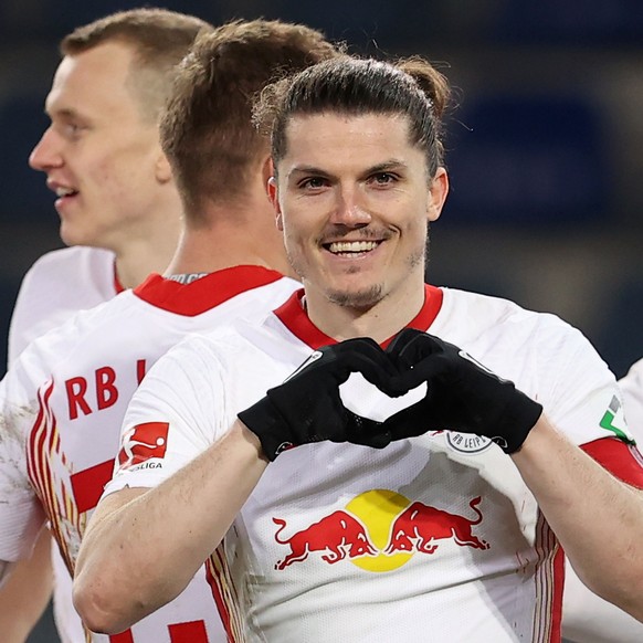 epa09084564 Marcel Sabitzer of Leipzig celebrates scoring the opening goal during the German Bundesliga soccer match between DSC Arminia Bielefeld and RB Leipzig at Schueco Arena in Bielefeld, Germany ...