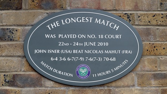 This photo taken on Tuesday, July 4, 2017 shows a plaque at the Wimbledon Tennis Championships in London. And the All England Club insists there is a very simple explanation for why the marker posted  ...