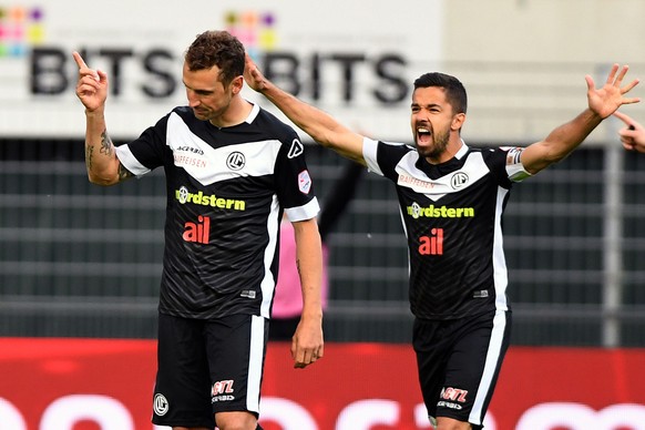 Lugano&#039;s player Gerndt Alexander left celebrate the 1 - 0 goal with Lugano&#039;s player Jonathan Sabbatini right, during the Super League soccer match FC Lugano against FC St. Gallen, at the Cor ...