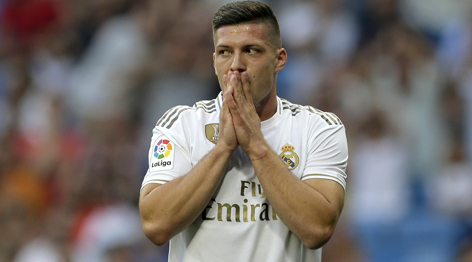 Real Madrid&#039;s Luka Jovic gestures during the Spanish La Liga soccer match between Real Madrid and Valladolid at the Santiago Bernabeu stadium in Madrid, Spain, Saturday, Aug. 24, 2019. (AP Photo/ ...