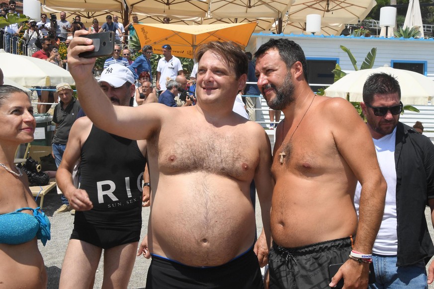 epaselect epa07767987 Italian Deputy Prime Minister and Interior Minister Matteo Salvini (R) takes a selfie with supporters during his &#039;Italian summer tour&#039; in Taormina, Sicily Island, south ...