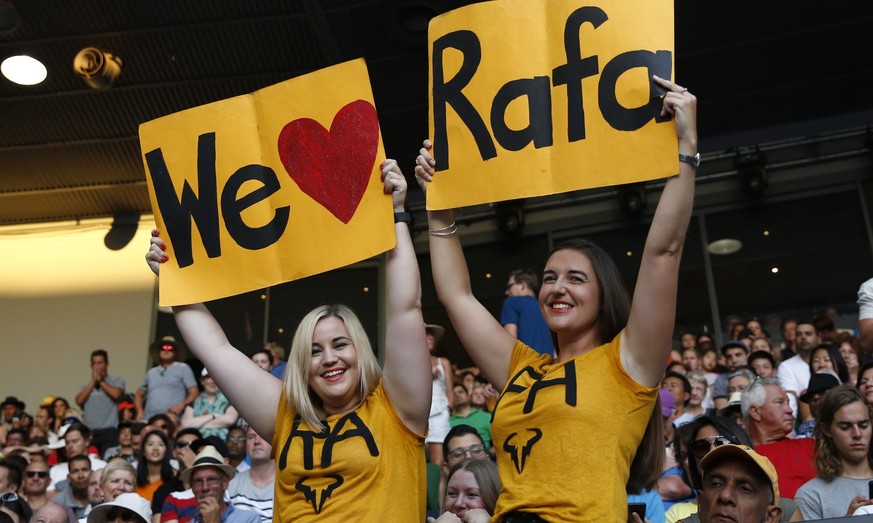 epa05753936 Spectators hold a placard reading &#039;We love Rafa&#039; during the Men&#039;s Singles semi-final match between Rafael Nadal of Spain and Grigor Dimitrov of Bulgaria at the Australian Op ...