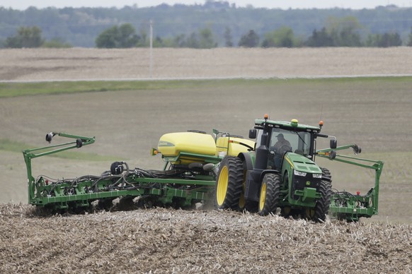 FILE - In this May 23, 2019, file photo, a farmer plants soybeans in a field in Springfield, Neb. The U.S. Trade Representative and Treasury Department have issued a statement defending Washington’s s ...