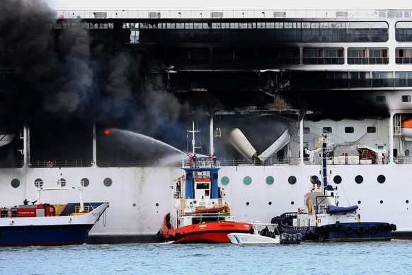 epa09069962 A fire broke out on the &#039;MSC Lirica&#039; cruiseship on 12 March 2021, while it was tied at the Corfu port, Ionian Sea, Greece, since January 30 for the winter season. Onboard were cr ...