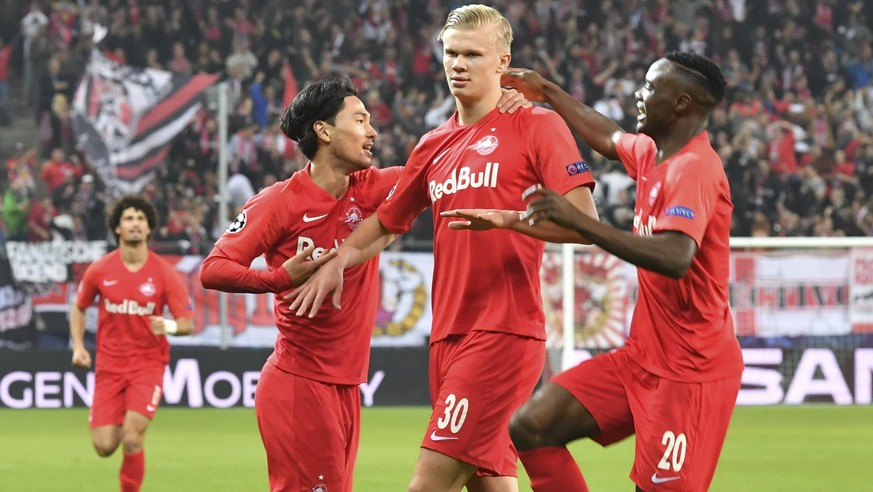 Salzburg&#039;s Erling Braut Haaland, second right, celebrates his goal before it is canceled by the video referee during the Champions League Group E soccer match between FC Red Bull Salzburg and Nap ...
