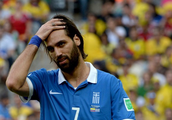 epa04256235 Georgios Samaras of Greece reacts during the FIFA World Cup 2014 group C preliminary round match between Colombia and Greece at the Estadio Mineirao in Belo Horizonte, Brazil, 14 June 2014 ...