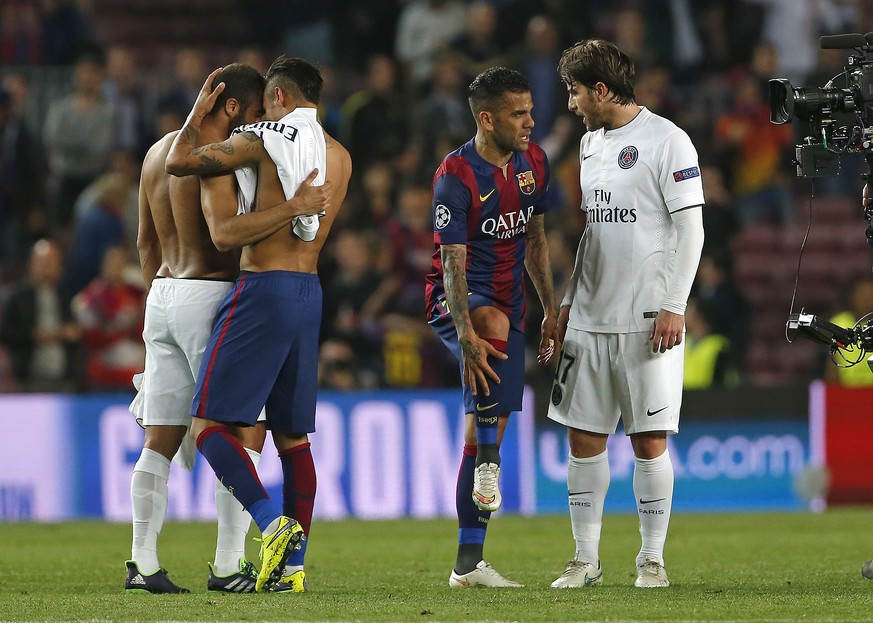 Barcelona&#039;s Neymar, second left and Dani Alves, greet PSG&#039;s Lucas, left, and Maxwell, right, after the Champions League quarterfinal second leg soccer match between FC Barcelona and Paris Sa ...