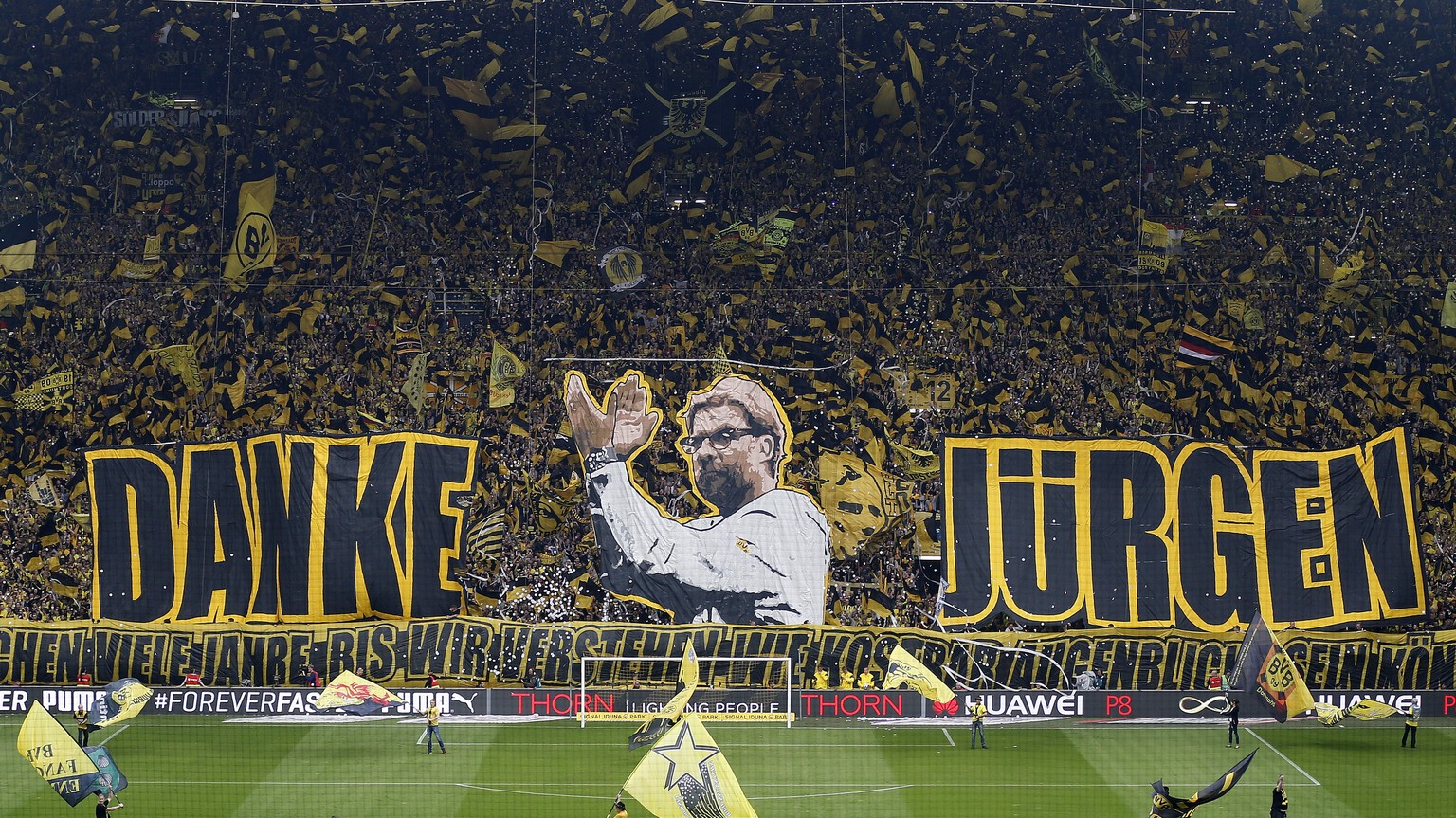 Dortmund supporters show banners to thank Dortmund&#039;s head coach Juergen Klopp prior to the German first division Bundesliga soccer match between BvB Borussia Dortmund and Werder Bremen in Dortmun ...