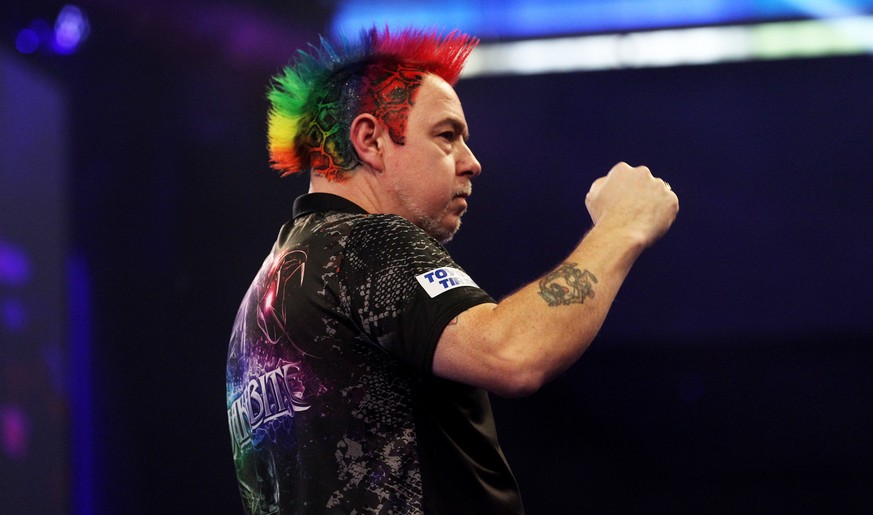 epa08095323 Peter Wright of Scotland reacts as he wins against Gerwyn Price of Wales during their PDC World Darts Championship Semi-Final match at the Alexander Palace in North London, Britain, 30 Dec ...