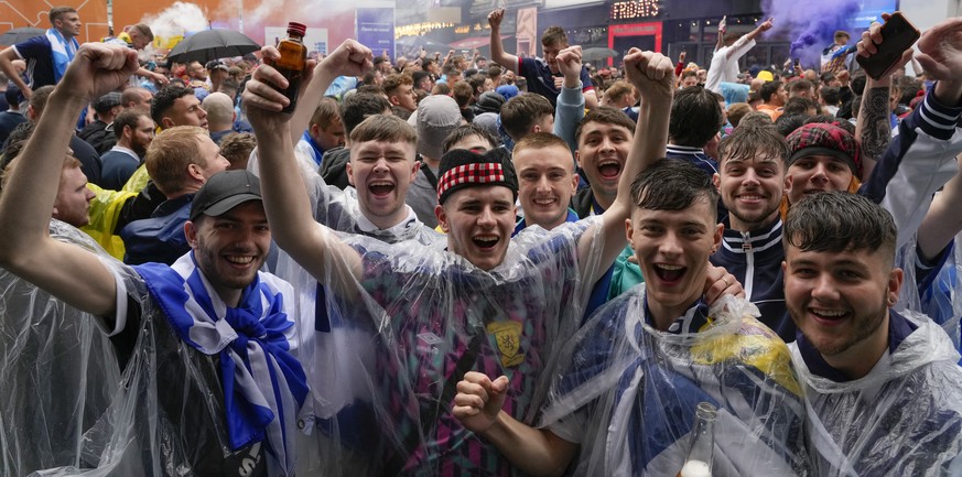 Scotland fans gather in Leicester Square prior to the Euro 2020 soccer championship group D match between England and Scotland, in London, Friday, June 18, 2021. (AP Photo/Kirsty Wigglesworth)