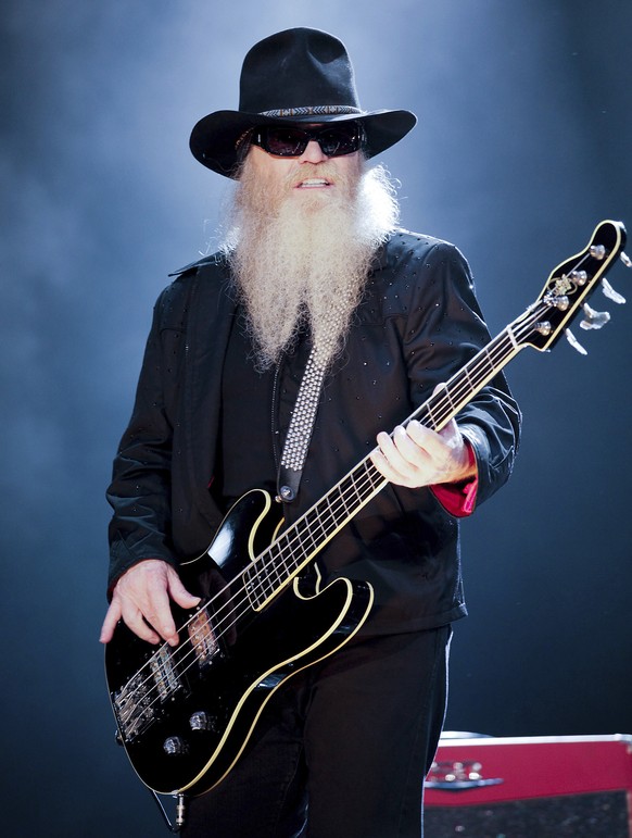 FILE - Bassist and vocalist Dusty Hill, from the US rock band, ZZ Top performs at the F1 Rocks concert on Sept. 25, 2009, in Singapore. ZZ Top has announced that Hill, one of the Texas blues trio&#039 ...
