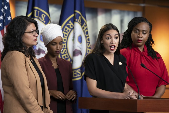 U.S. Rep. Alexandria Ocasio-Cortez, D-N.Y., speaks as, from left, Rep. Rashida Tlaib, D-Mich., Rep. Ilhan Omar, D-Minn., and Rep. Ayanna Pressley, D-Mass., listen during a news conference at the Capit ...