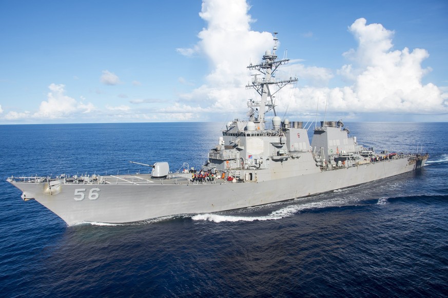 epa06154048 A handout photo dated 14 June 2017, made available by the US Navy on 10 August 2017 showing the Arleigh Burke-class guided-missile destroyer USS John S. McCain (DDG 56) maneuvering alongsi ...