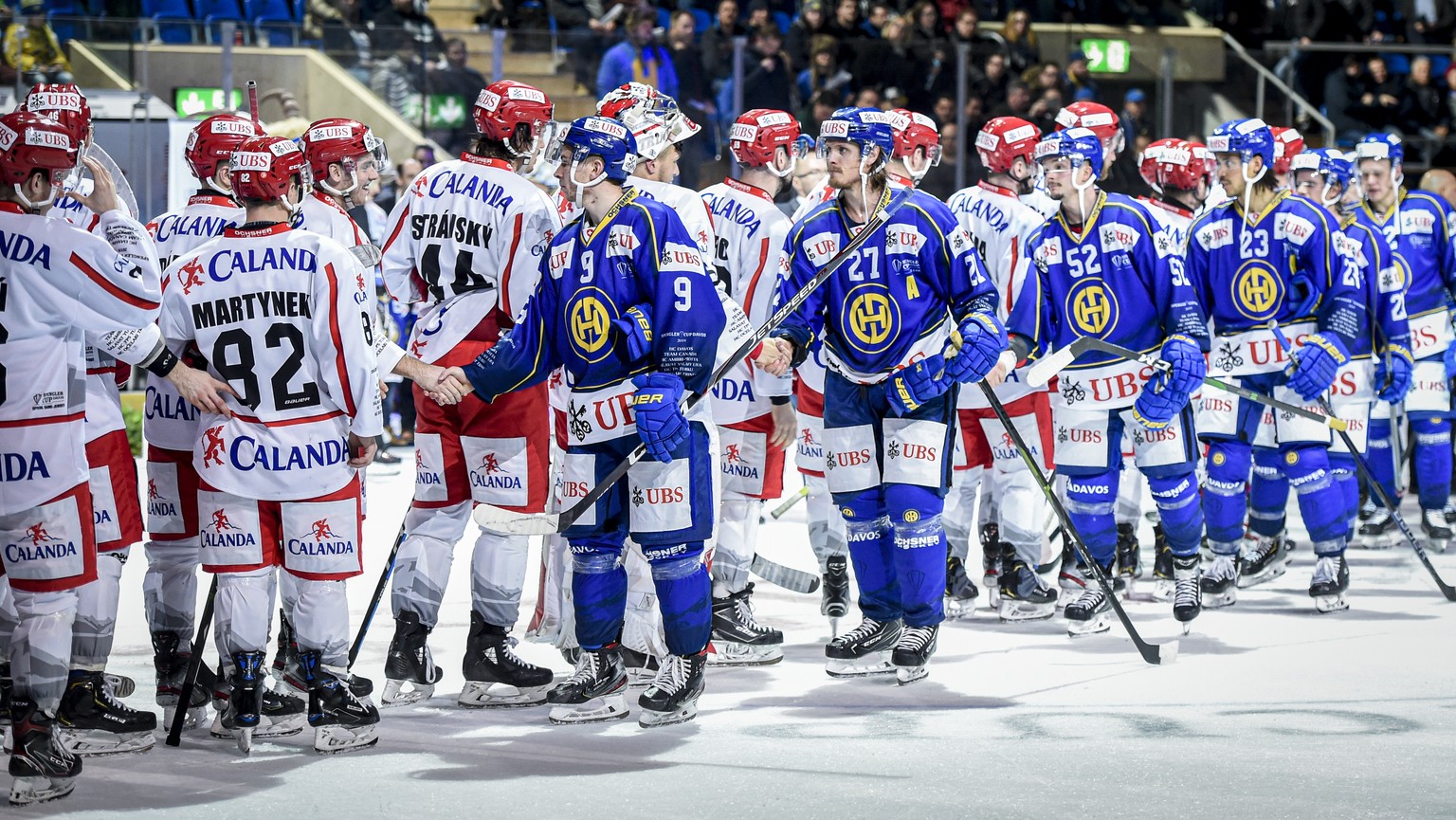 Davos&#039; Magnus Nygren and the team after the game between HC Davos and HC Ocelari Trinec, at the 93th Spengler Cup ice hockey tournament in Davos, Switzerland, Friday, December 27, 2019. (KEYSTONE ...
