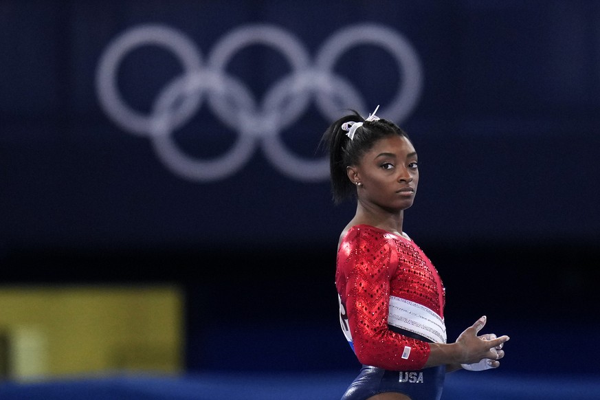 Simone Biles, of the United States, waits to perform on the vault during the artistic gymnastics women&#039;s final at the 2020 Summer Olympics, Tuesday, July 27, 2021, in Tokyo. The American gymnasti ...