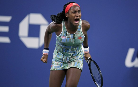 Coco Gauff. of the United States, celebrates after defeating Timea Babos, of Hungary, during the second round of the U.S. Open tennis tournament in New York, Thursday, Aug. 29, 2019. (AP Photo/Charles ...