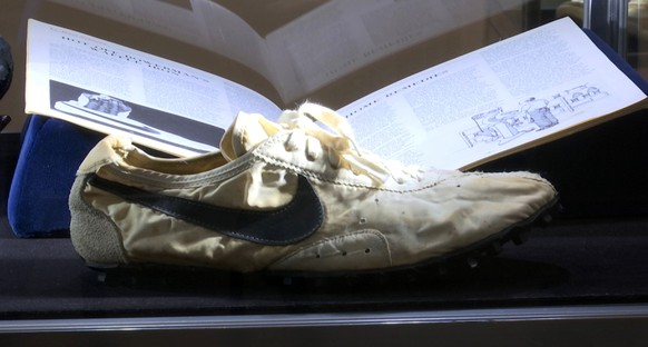 This image taken from video shows the Nike handmade Moon Shoe, designed by Nike co-founder Bill Bowerman in 1972, on display in New York on Friday, July 12, 2019. The sneaker is among 100 pairs of rar ...