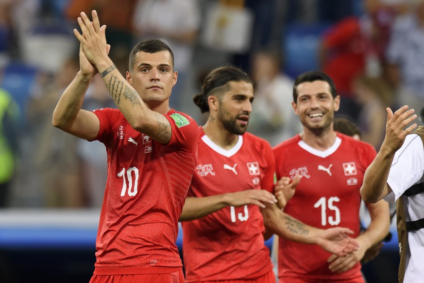 From left, Switzerland&#039;s midfielder Granit Xhaka, Switzerland&#039;s defender Ricardo Rodriguez and Switzerland&#039;s midfielder Blerim Dzemaili react after the FIFA World Cup 2018 group E preli ...