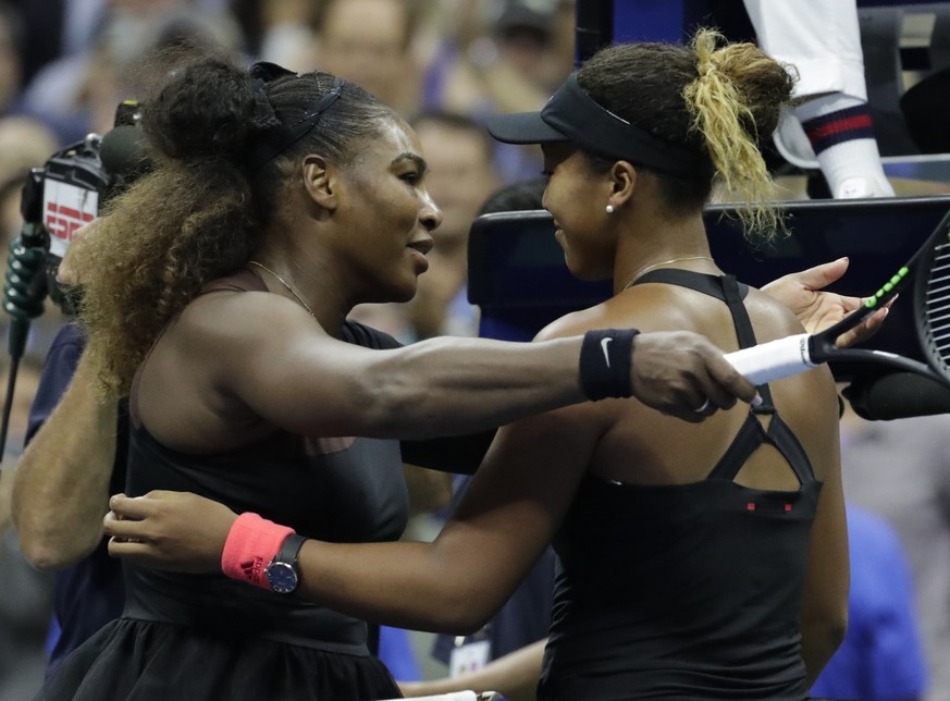 Serena Williams hugs Naomi Osaka, of Japan, after Osaka defeated Williams in the women&#039;s final of the U.S. Open tennis tournament, Saturday, Sept. 8, 2018, in New York. (AP Photo/Julio Cortez)