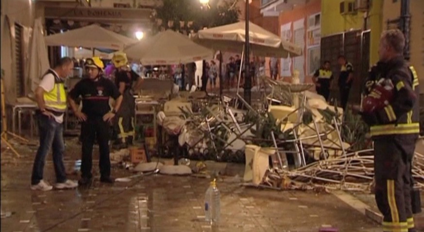 Police and rescue services are pictured at the scene after a gas cylinder exploded in a cafe in Velez-Malaga, Spain October 1, 2016 in this still image taken from video. Wikono via Reuters TV ATTENTIO ...