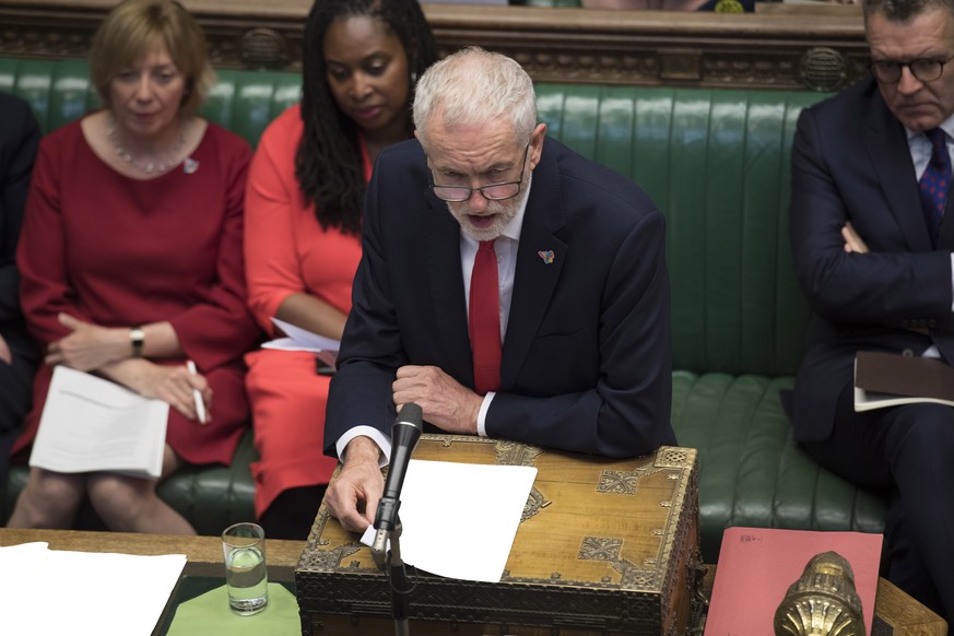 epa07658450 A handout photo made available by the UK Parliament shows British Labour party opposition leader Jeremy Corbyn (C) during Prime Minister&#039;s Questions (PMQs) at the House of Commons in  ...